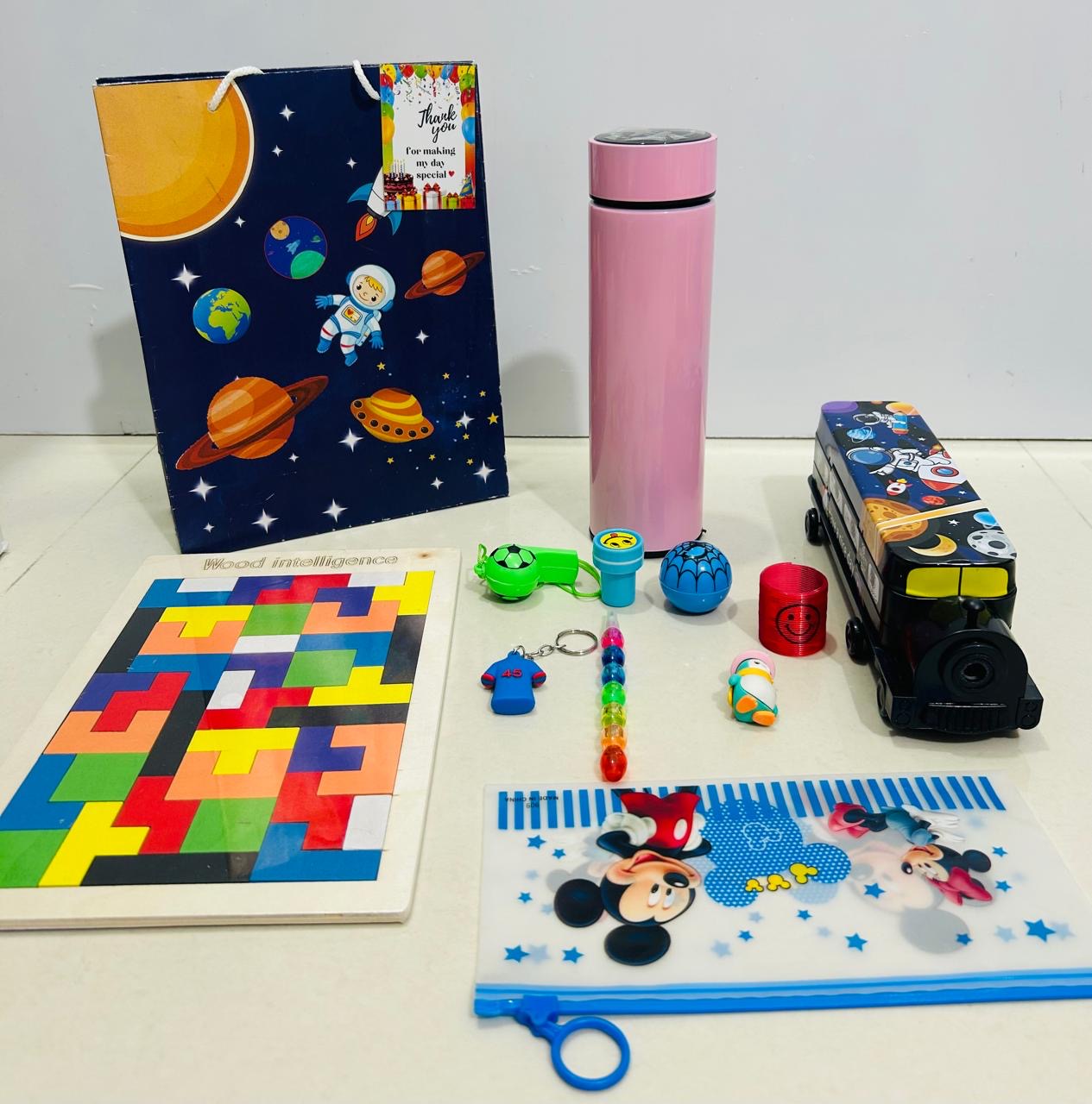 Bottle , puzzle, stationary box hamper