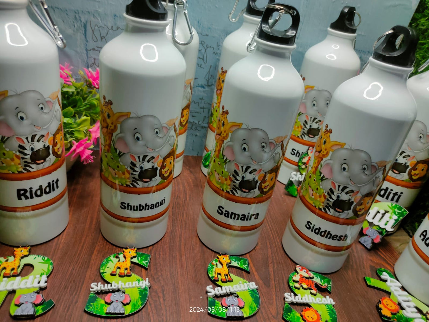 Customised water bottle with fridge magnet combo