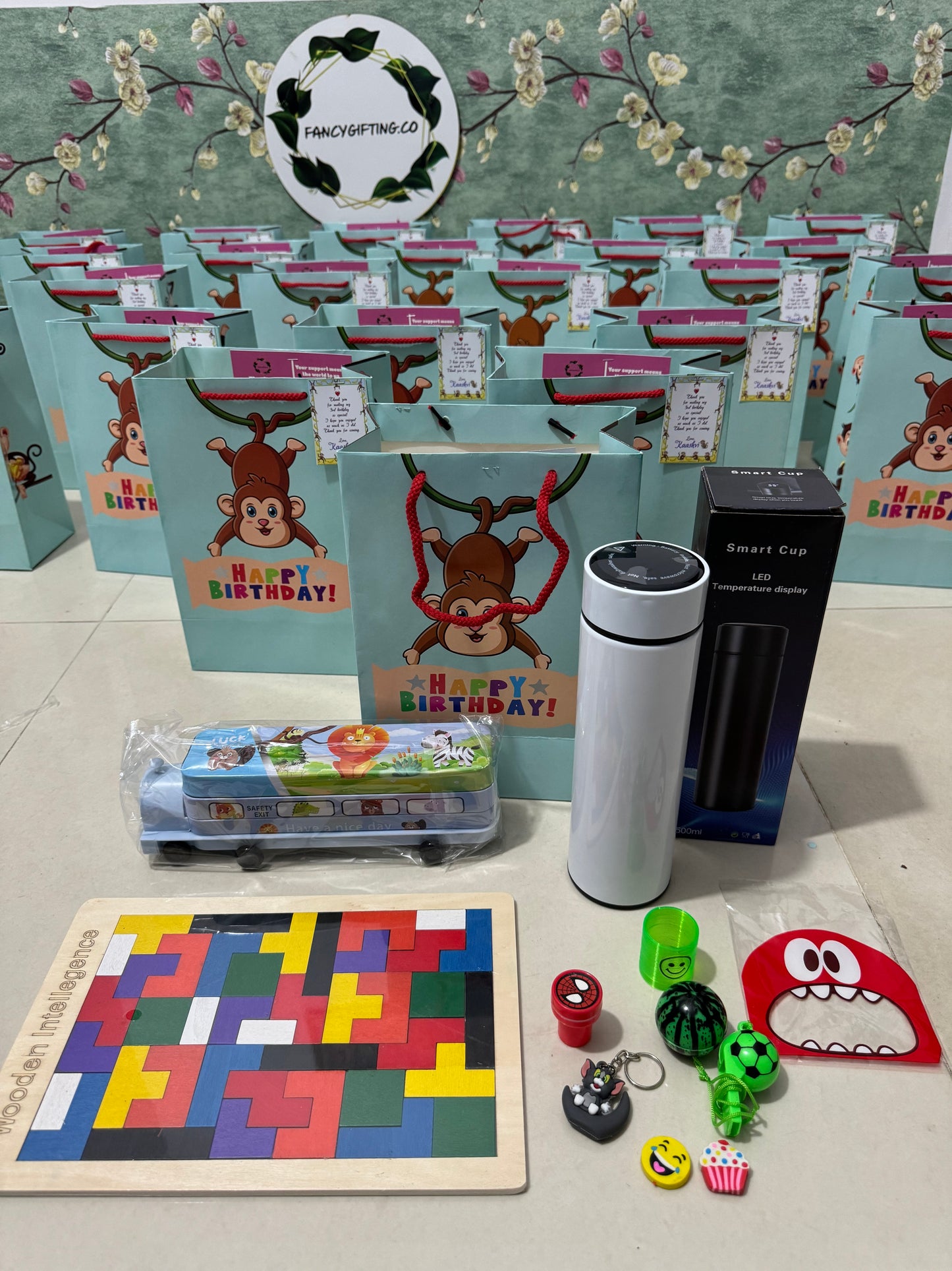 Bottle , puzzle, stationary box hamper