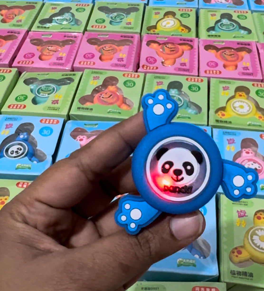 Slap band with spinner and lights