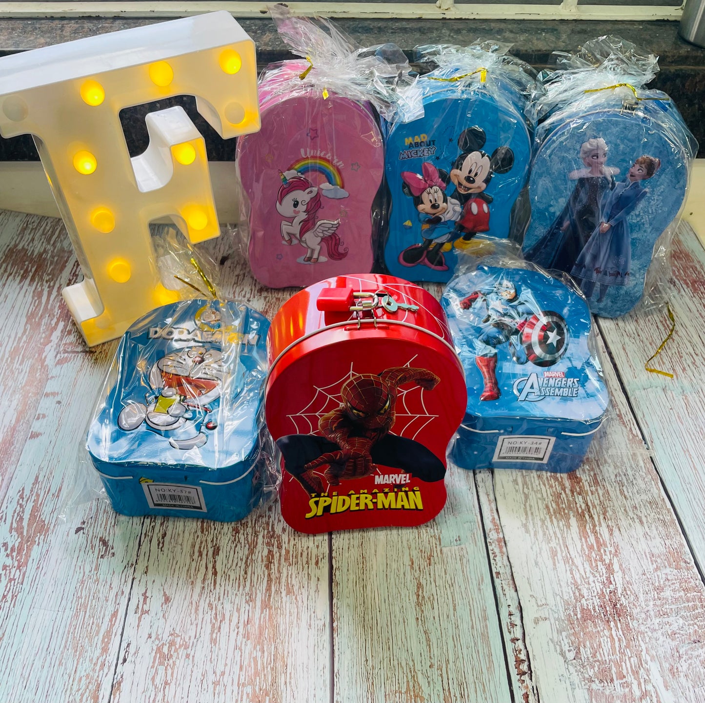 Metal piggy banks- assorted prints