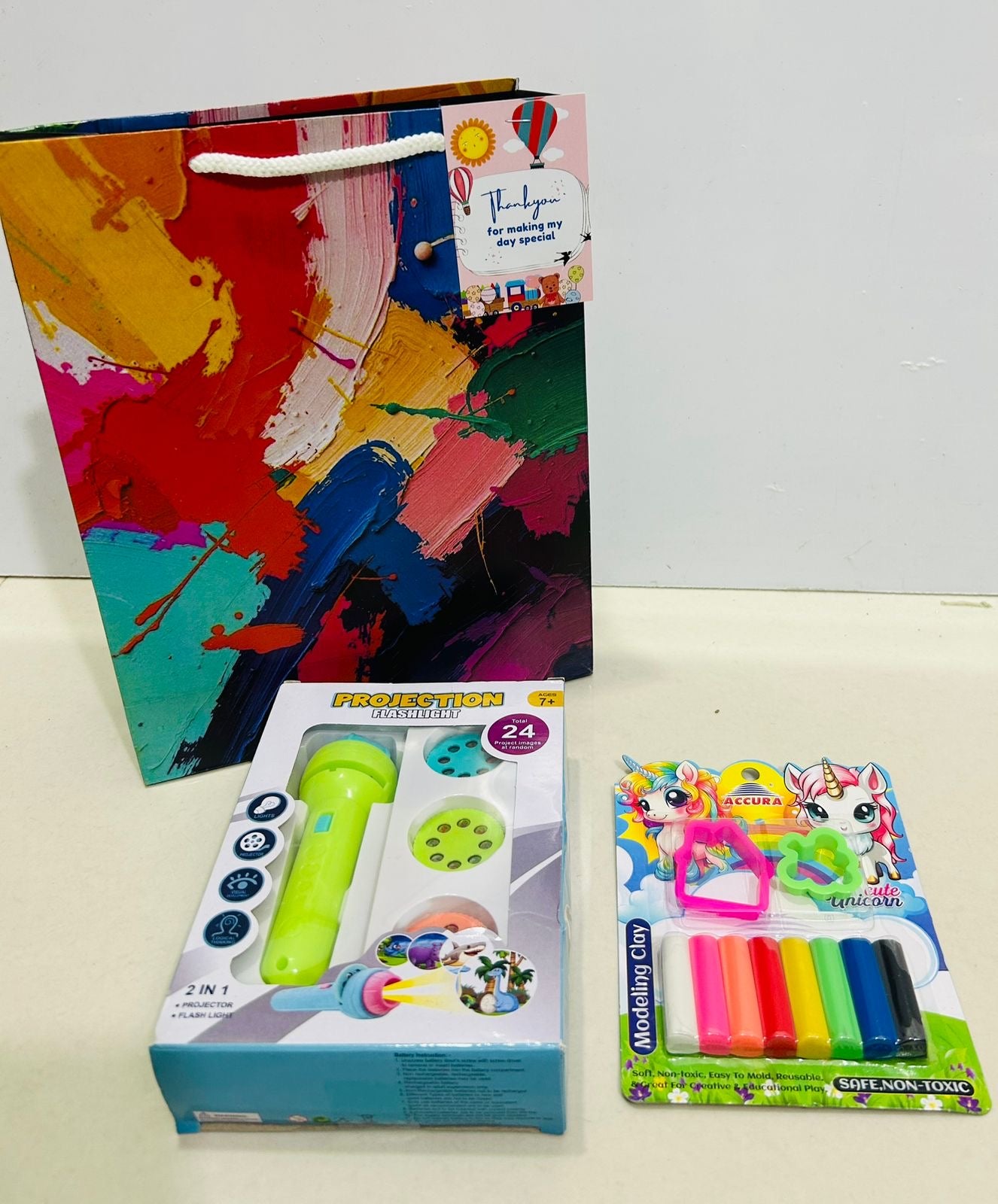 Projector light with clay kit combo