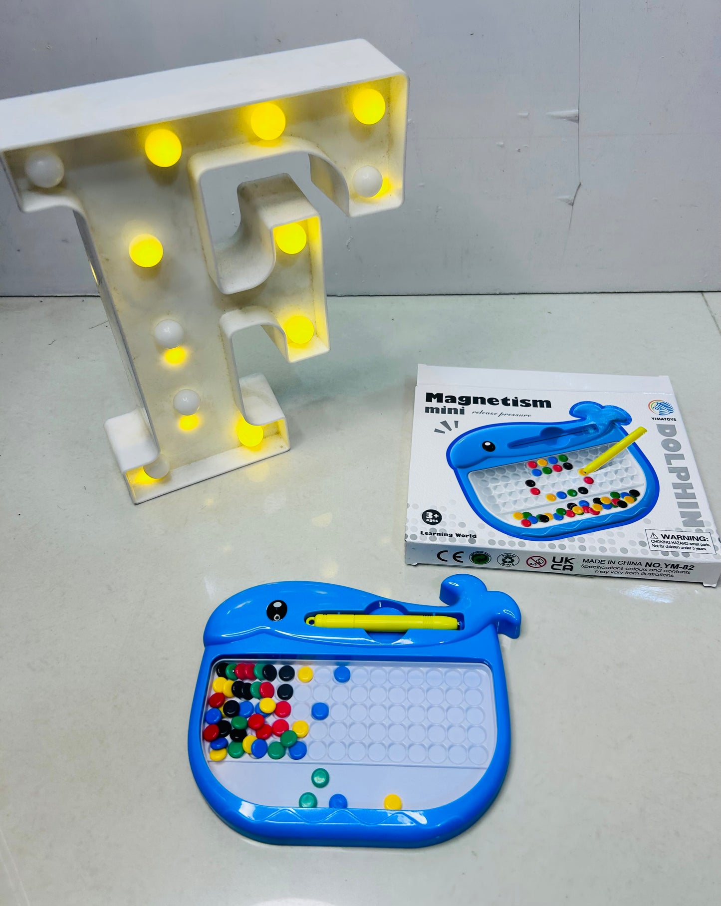 Magnetic beads board game